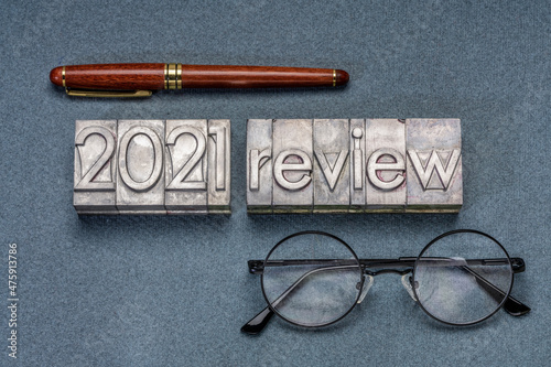 2021 review banner - annual review or summary of the recent year - word abstract in grunge letterpress metal type blocks, business and financial concept