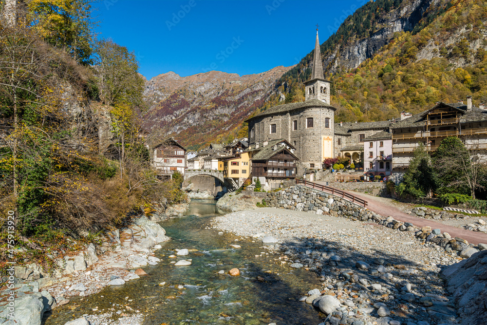 The beautiful village of Campertogno, during fall season, in Valsesia (Sesia Valley). Province of Vercelli, Piedmont, Italy. The beautiful village of Campertogno, during fall season, in Valsesia (Sesia Valley). Province of Vercelli, Piedmont, Italy.