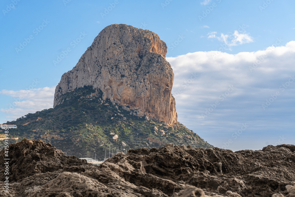 Peñon de Ifach in Calpe, on a morning with sun and clouds.