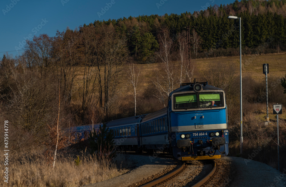 Naklejka premium Fast passenger expres train in Kajov station in south Bohemia