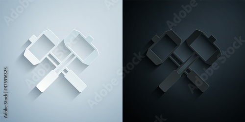 Paper cut Medieval crossed battle hammers icon isolated on grey and black background. Paper art style. Vector