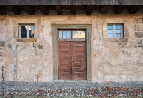 Old door and windows of an ancient house 