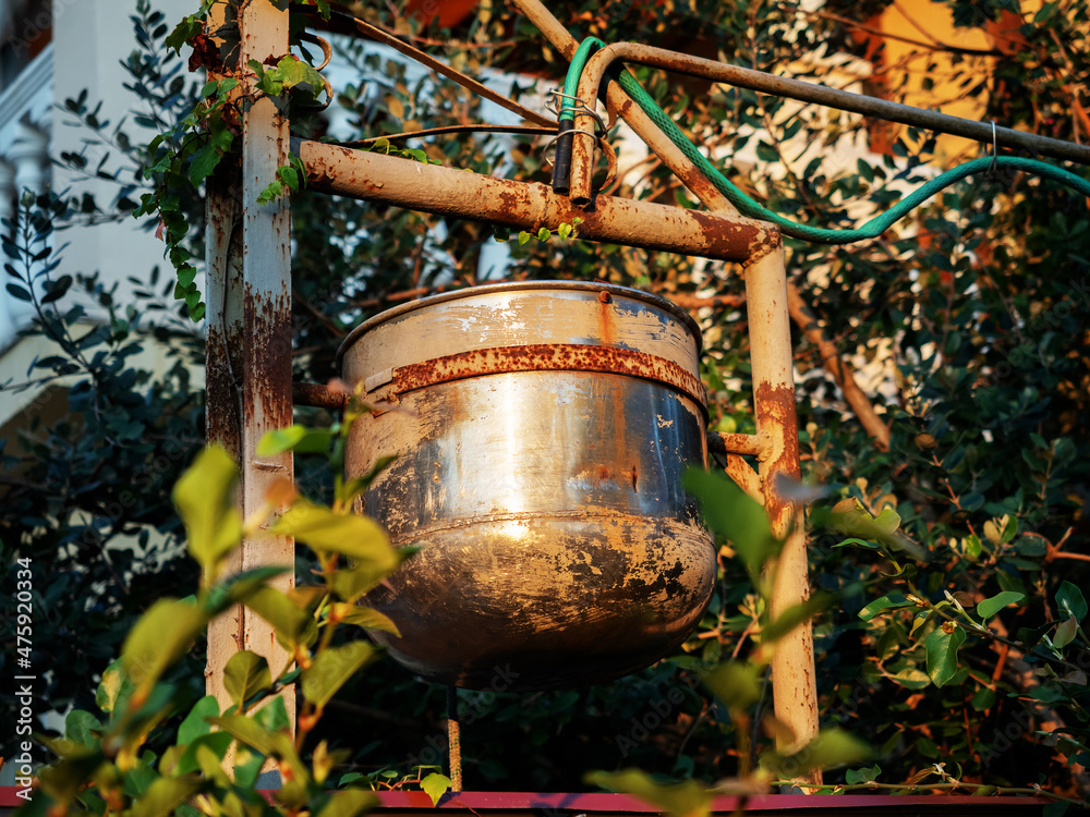 Metal vessel for water to water the garden