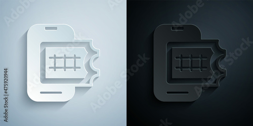 Paper cut Online ticket booking and buying app interface icon isolated on grey and black background. E-tickets ordering. Electronic train ticket on screen. Paper art style. Vector
