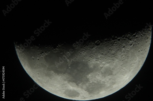 Foto Moon close up seen through a telescope
