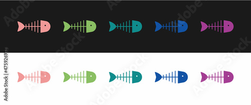Set Fish skeleton icon isolated on black and white background. Fish bone sign. Vector