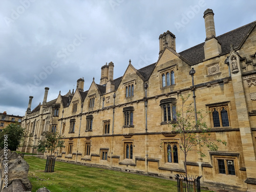 Cloudy gloomy sky over the Magdalen College, Oxford, England photo