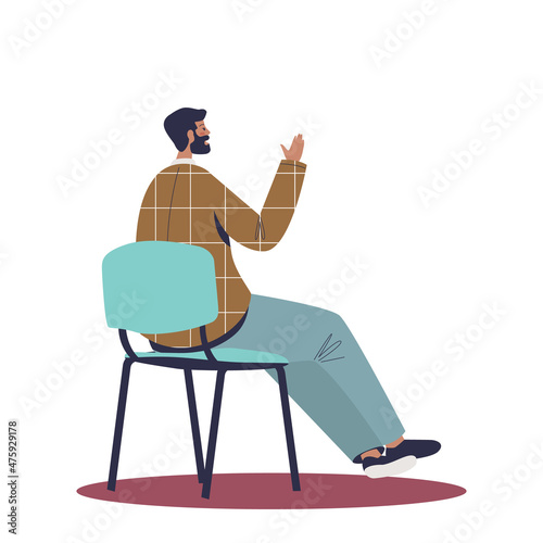 Man raising hand while listening to development training courses or lecture sit on chair, back view