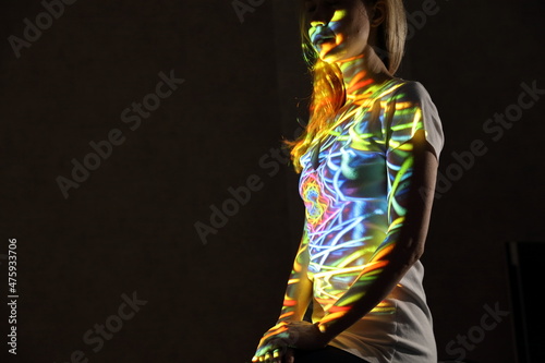 Fotografia Woman with aura color lights on her body