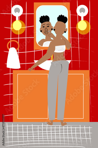 Transgender man shaving in the bathroom 