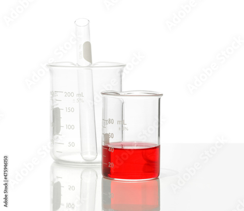Closeup chemical ingredient on white laboratory table. Potassium Ferricyanide Liquid in Beaker. Side View