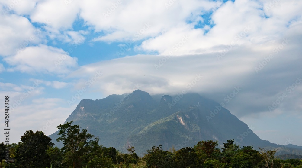 clouds over the mountain  , Doi Luang Chiang Dao is Thailand's tallest limestone mountain in Chiang Mai  - Thailand