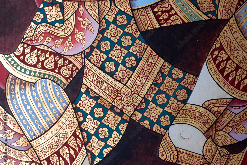Fototapeta premium Ancient Thai pattern on wall in Thailand Buddha Temple , Asian Buddha style art.
