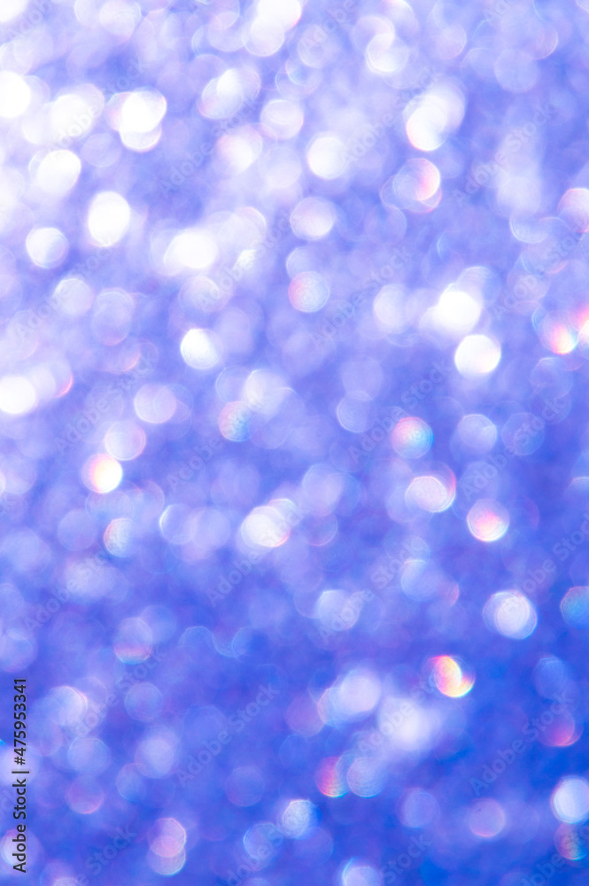 bright glitter background: bokeh effect from many colored lights on frozen glass, toning bright glitter background: bokeh effect from many colored lights on frozen glass, toning