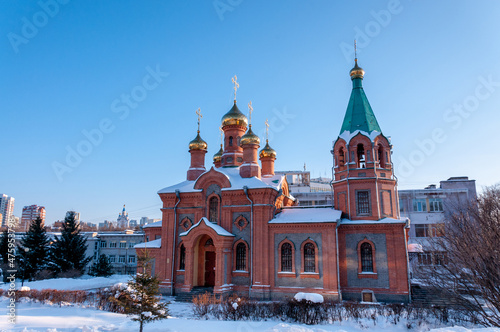 Brick building of the Church of St. Innocent of Irkutsk in winter in the city of Khabarovsk