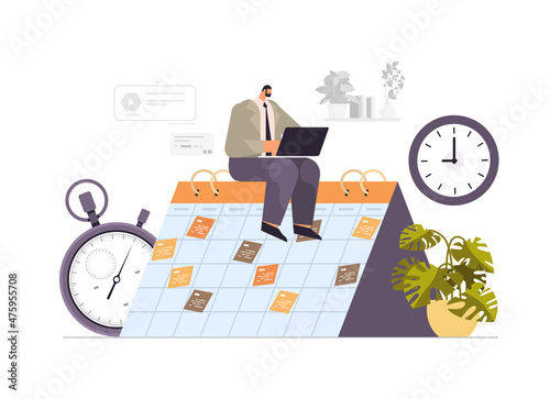 businessman planning day scheduling appointment agenda meeting plan time management concept