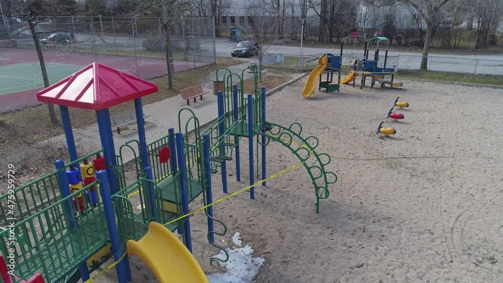 Panning view above the closed playground due to Covid19, showing the