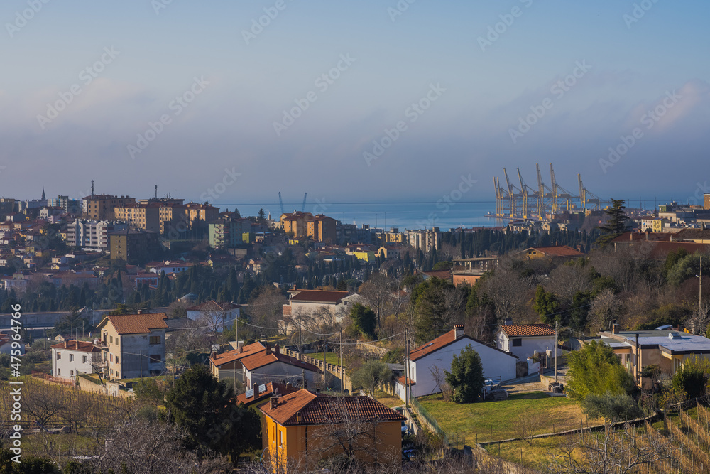 Obraz premium Views from former train track between Trieste and Kozina, above valley of Glinscica or Rosandra on a sunny winter day. View of city of trieste below