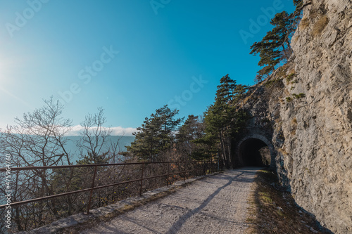Views from former train track between Trieste and Kozina, above valley of Glinscica or Rosandra on a sunny winter day. View of one of the tunnels photo