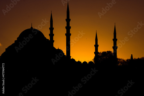 Mosque background. Silhouette of Suleymaniye Mosque at sunset.