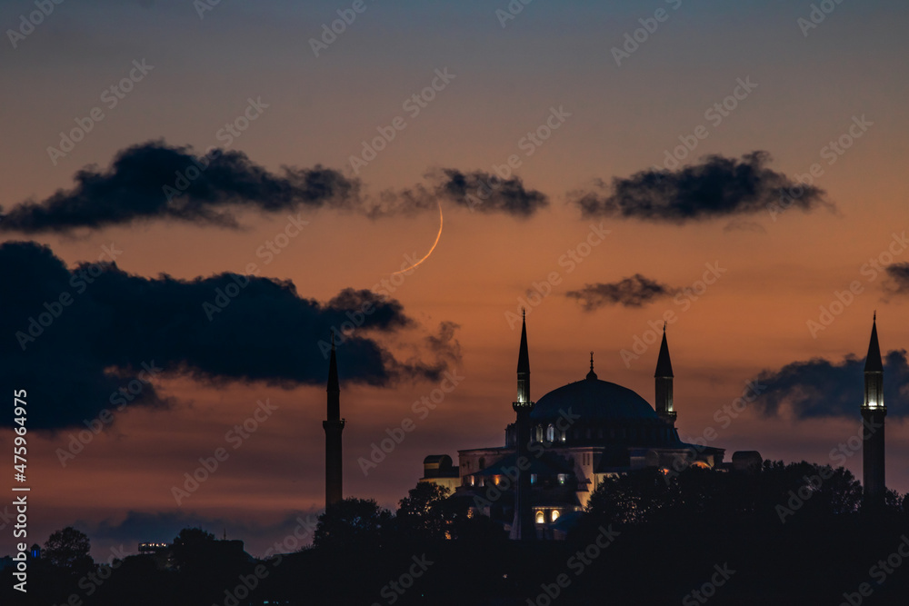 Ramadan background photo. Hagia Sophia or Ayasofya with Crescent moon at sunset