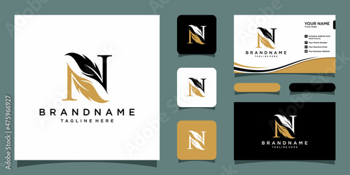 Initial letter N logo with Feather Luxury gold Premium Vector