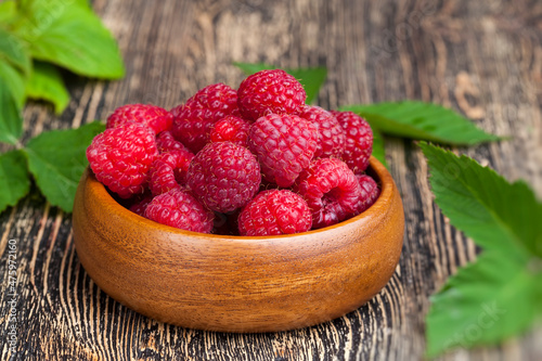 harvested red raspberries, close up