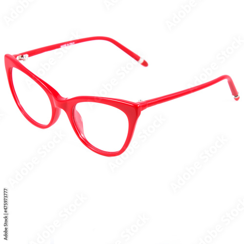 Red glasses frames on white background. Sun goggles and glasses for vision in red frames.