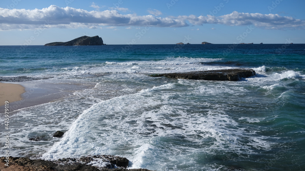 The calming blue sea water of Ibiza