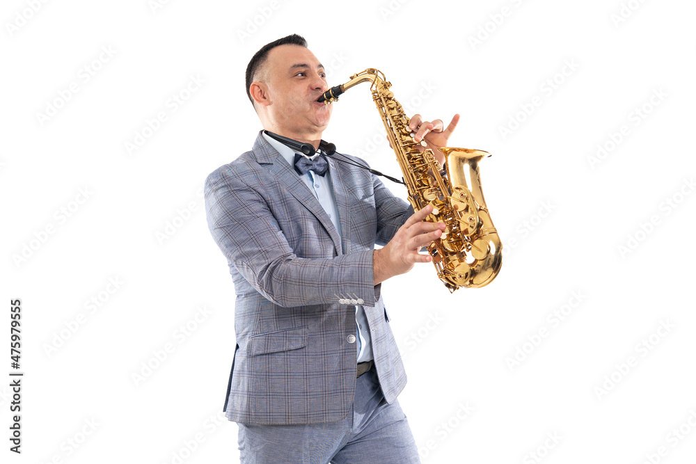 Naklejka premium Musician man in a suit plays on saxophone isolated on white background