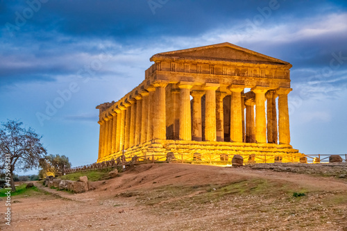 Temple of Concordia in the Valley of the Temples at sunset in Agrigento - Sicily, Italy.
