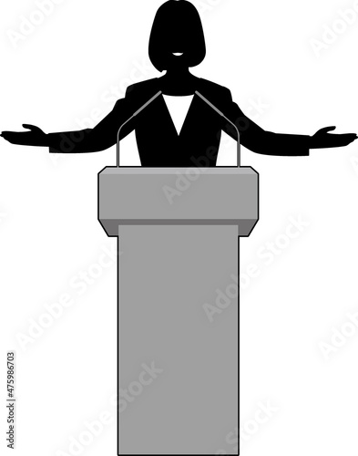 演台でスピーチする女性③