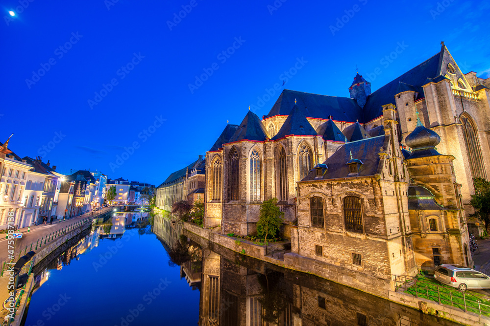 GHENT, BELGIUM - APRIL 30, 2015: View of Graslei quay and Leie river in the historic city center in Gent, Belgium. Architecture and landmark of Ghent in spring season.