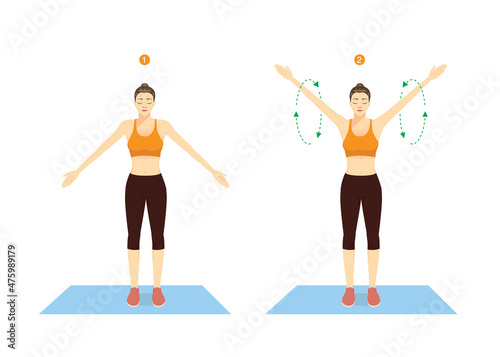 Sport woman doing exercise with Big Arm Circles posture for warm up. Rotation arms help to prevent injuries and prepare your body for strength training.