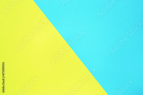 Free Download blue and yellow pastel color paper texture top view minimal flat lay background - GFXLoad