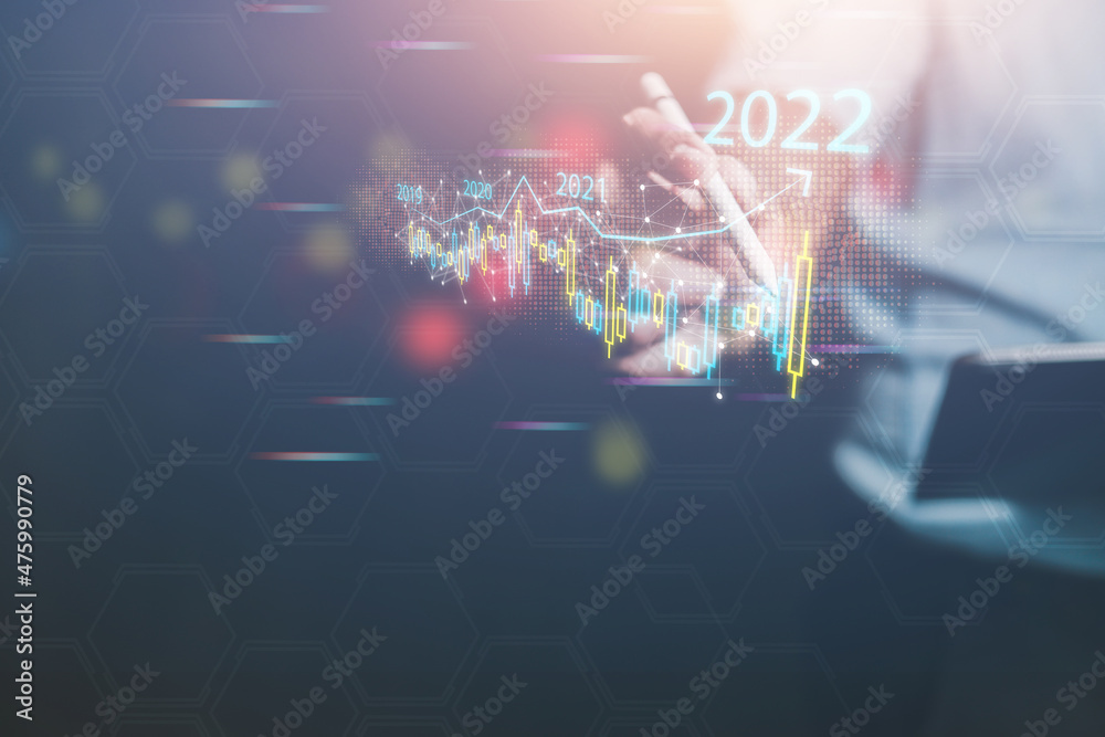 Businessmen analyze business investments in this new year. Demonstrates the trends driving digital online shopping to develop future online businesses. 2022 concept
