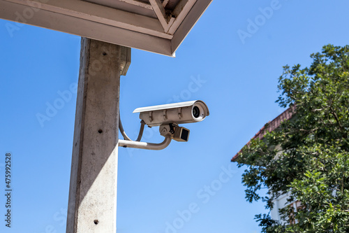 CCTV camera installed outside the building safety protection concept.