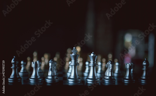Chess board game silver team and gold team is strategy game as business challenge competitive game ,this business strategy plan concept.