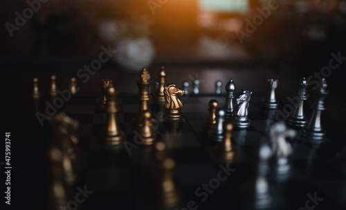 Fotografie, Obraz Chess board game silver team and gold team is strategy game as business challenge competitive game ,this business strategy plan concept