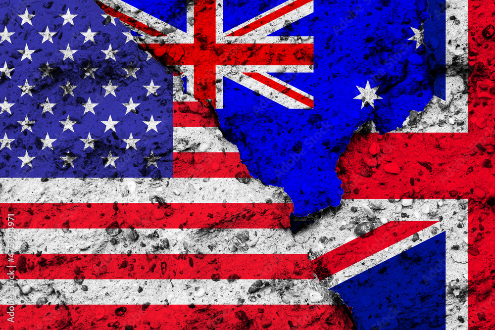 Obraz premium Concept of the Relationship between the United States of America, the United Kingdom and Australia with Flags on a Wall