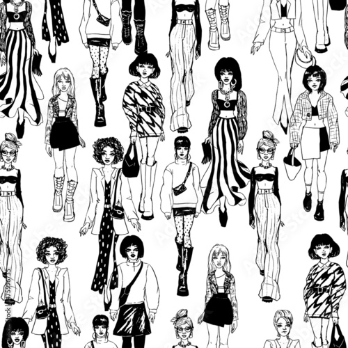 Seamless pattern. Women in trendy clothes. Defile sketch.