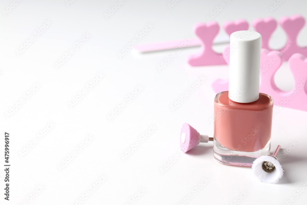 Concept of nail care with manicure accessories on white background Concept of nail care with manicure accessories on white background