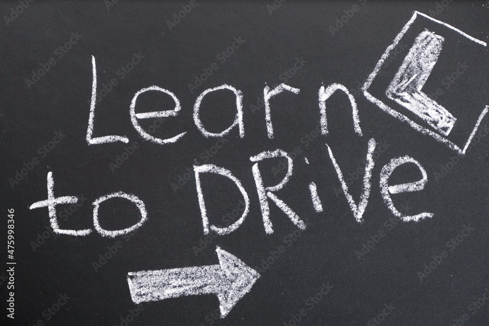 Fototapeta premium Driving school chalkboard, Educational and Creative composition with the Learn to drive caption