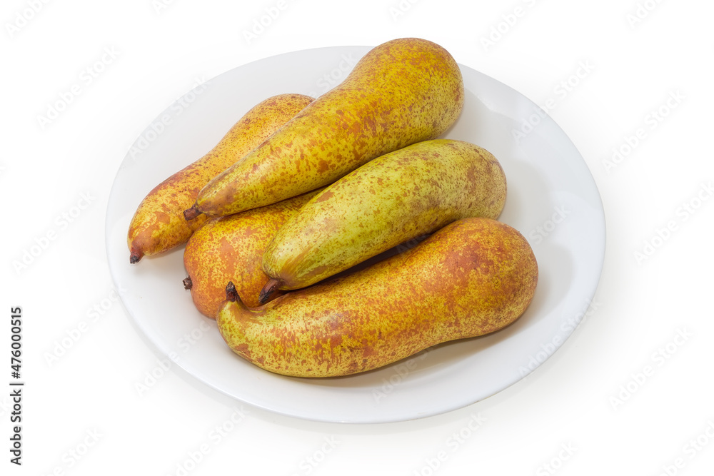 Pears of Bosc variety on dish on a white background Pears of Bosc variety on dish on a white background