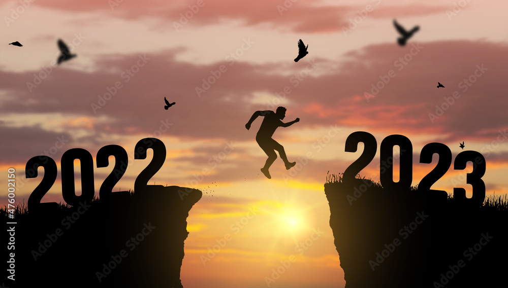 Welcome Merry Christmas and Happy New Year in 2023, Vector black silhouette man jumping from 2022 cliff to 2023 cliff with cloudy sky and sunlight. Welcome Merry Christmas and Happy New Year in 2023, Vector black silhouette man jumping from 2022 cliff to 2023 cliff with cloudy sky and sunlight.