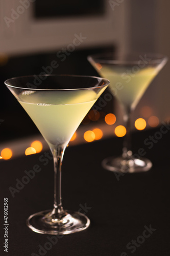 Two cocktails in martini glasses