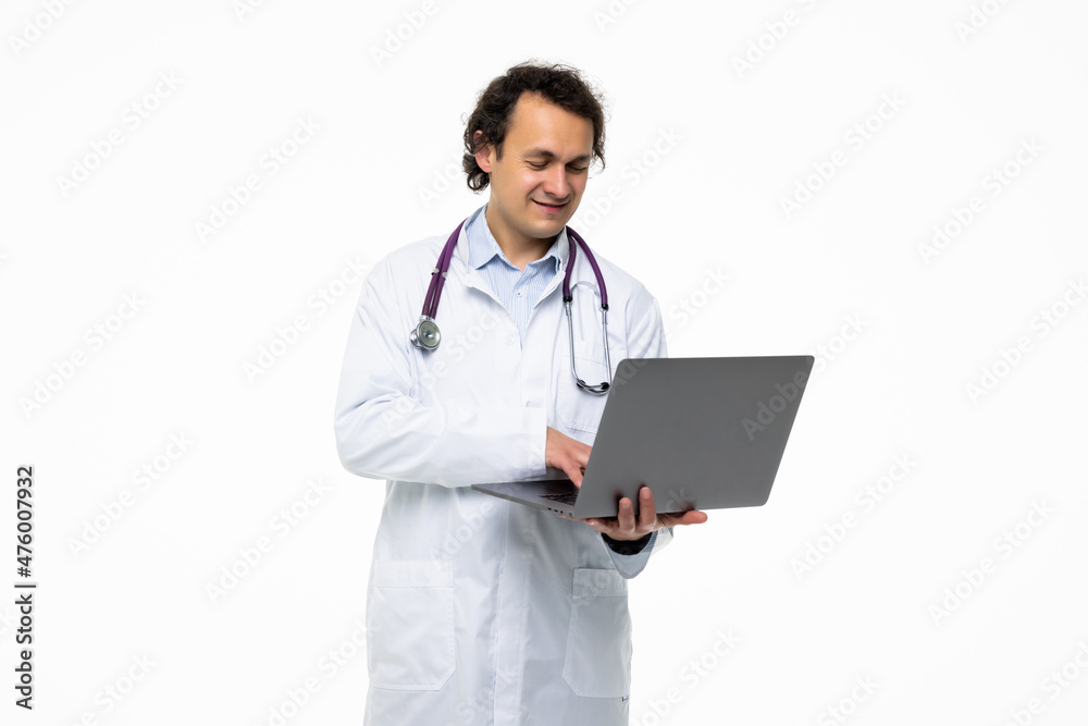 Happy Doctor Holding Laptop Looking At Camera Isolated On White Background Happy Doctor Holding Laptop Looking At Camera Isolated On White Background