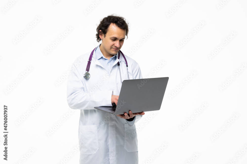 Doctor with laptop conducts an online video call and talks to patient. Doctor with laptop conducts an online video call and talks to patient.