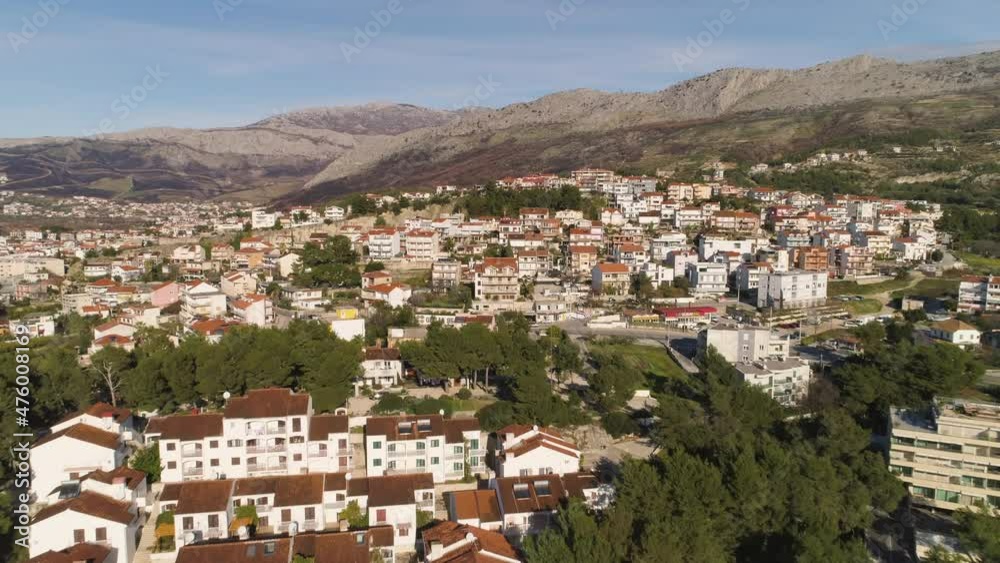 Hilly landscape and majestic buildings of Split town in Croatia, aerial fly forward shot Hilly landscape and majestic buildings of Split town in Croatia, aerial fly forward shot