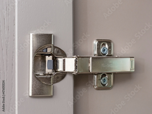 Furniture door hinge. Standard metal hinge for furniture. 